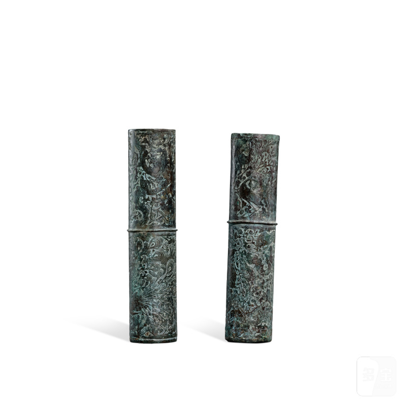 A pair of archaic bronze 'mythical beasts' fittings, Western Han dynasty | 西漢 青銅神獸紋端飾
